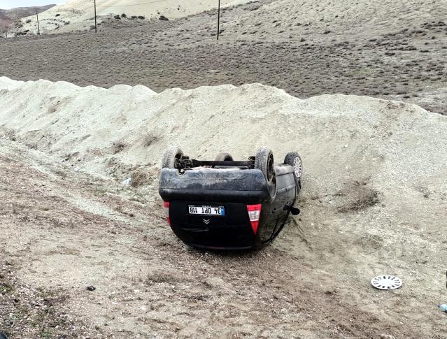 Takla atan araçtan yara almadan kurtuldu